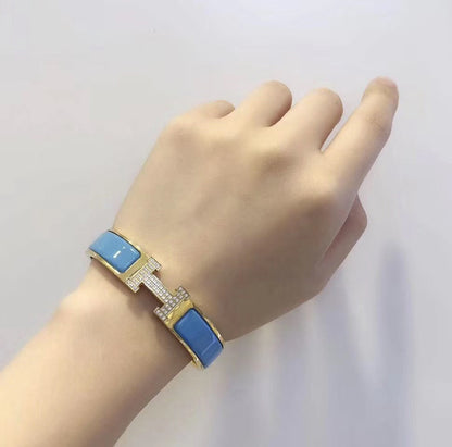 [AURORA]H CLOUD BLUE ARMBAND GOLD DIAMANT