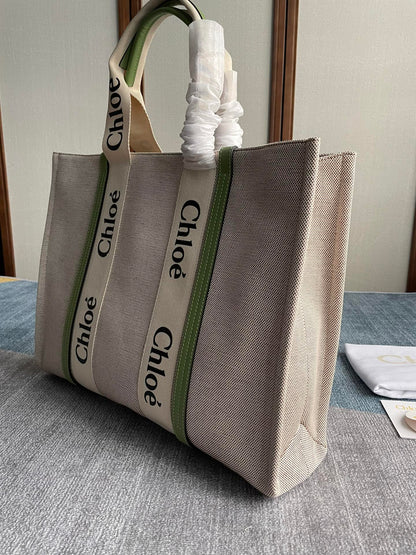 LAGRE WOODY TOTE BAG 45 IN BEIGE LINEN CANVAS BLACK WEBBING LOGO EMBROIDER GREEN CALFSKIN