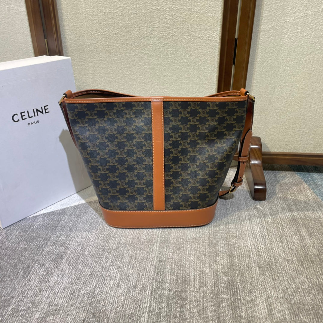 BUCKET 33 IN BLACK TRIOMPHE CANVAS AND BRONZE BROWN CALFSKIN TRIM