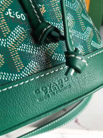 PETIT FLOT BUCKET BAG 22 IN GREEN GOYARDINE CANVAS AND LAMBSKIN TRIM