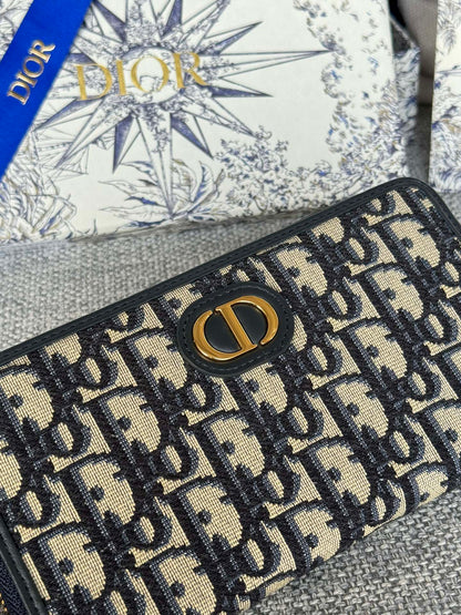 MONTAIGNE VOYAGEUR LONG WALLET 20 IN BLACK MONOGRAM OBLIQUE JACQUARD