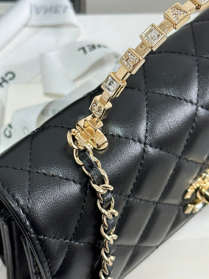 FLAP BAG 18 WITH HANDLE IN BLACK CALFSKIN GOLD HARDWARE